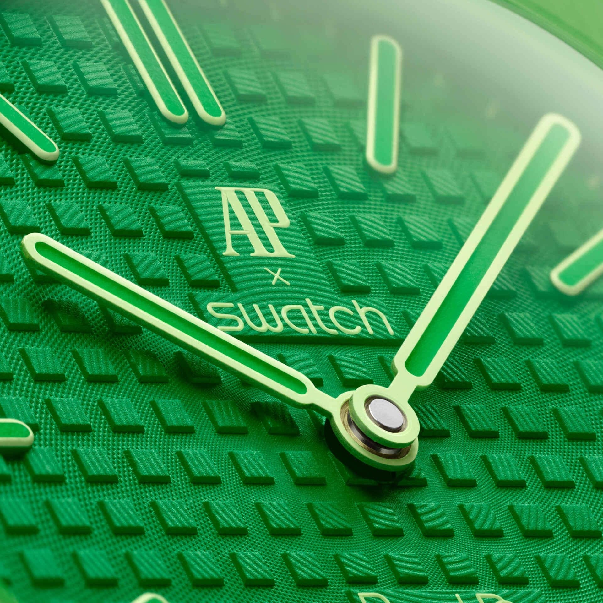 Close-up of the inkspireluxury Audemars Piguet x swatch green textured dial with iconic AP and swatch branding