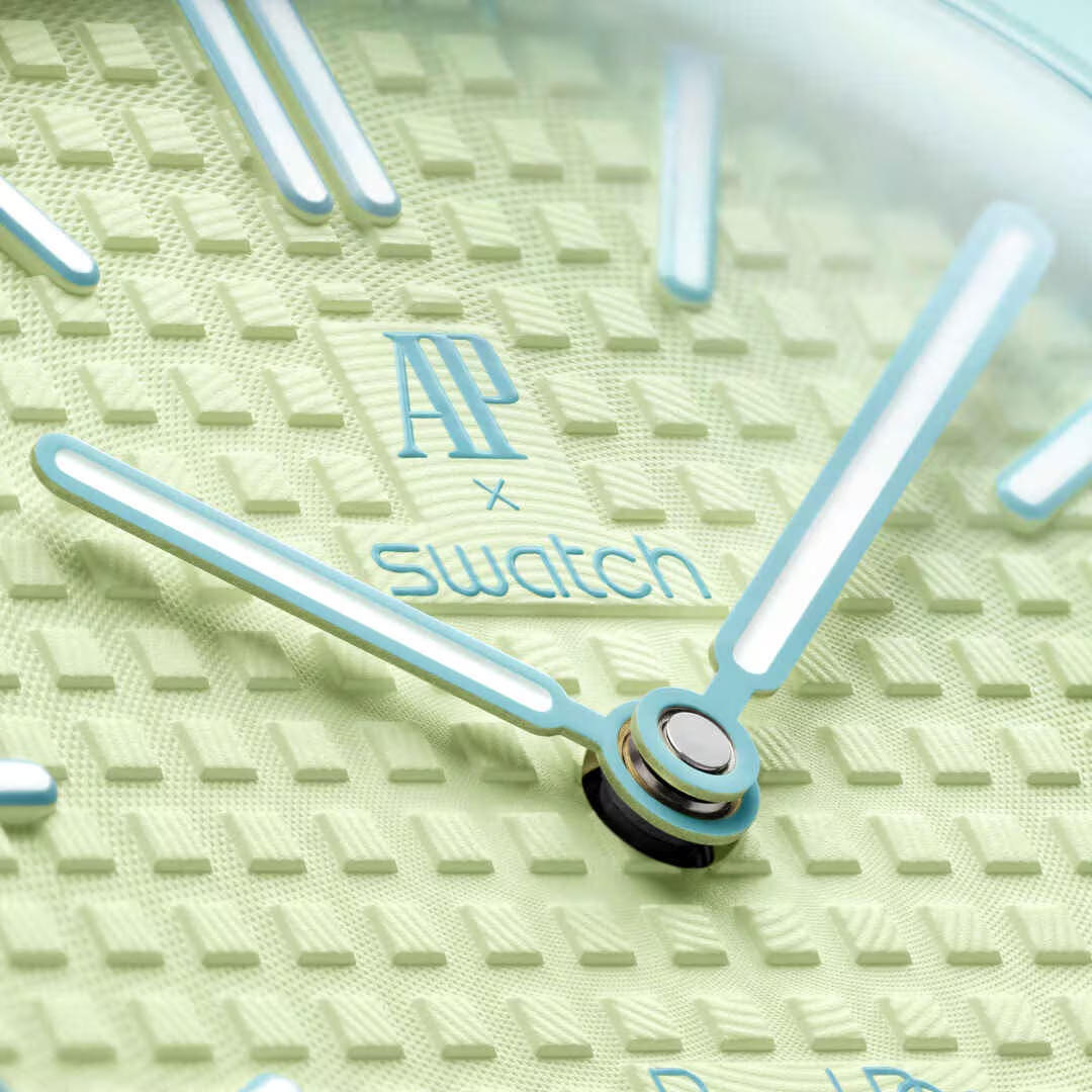 inkspireluxury Audemars Piguet x Swatch pocket watch dial in pastel mint and lime with textured grid pattern