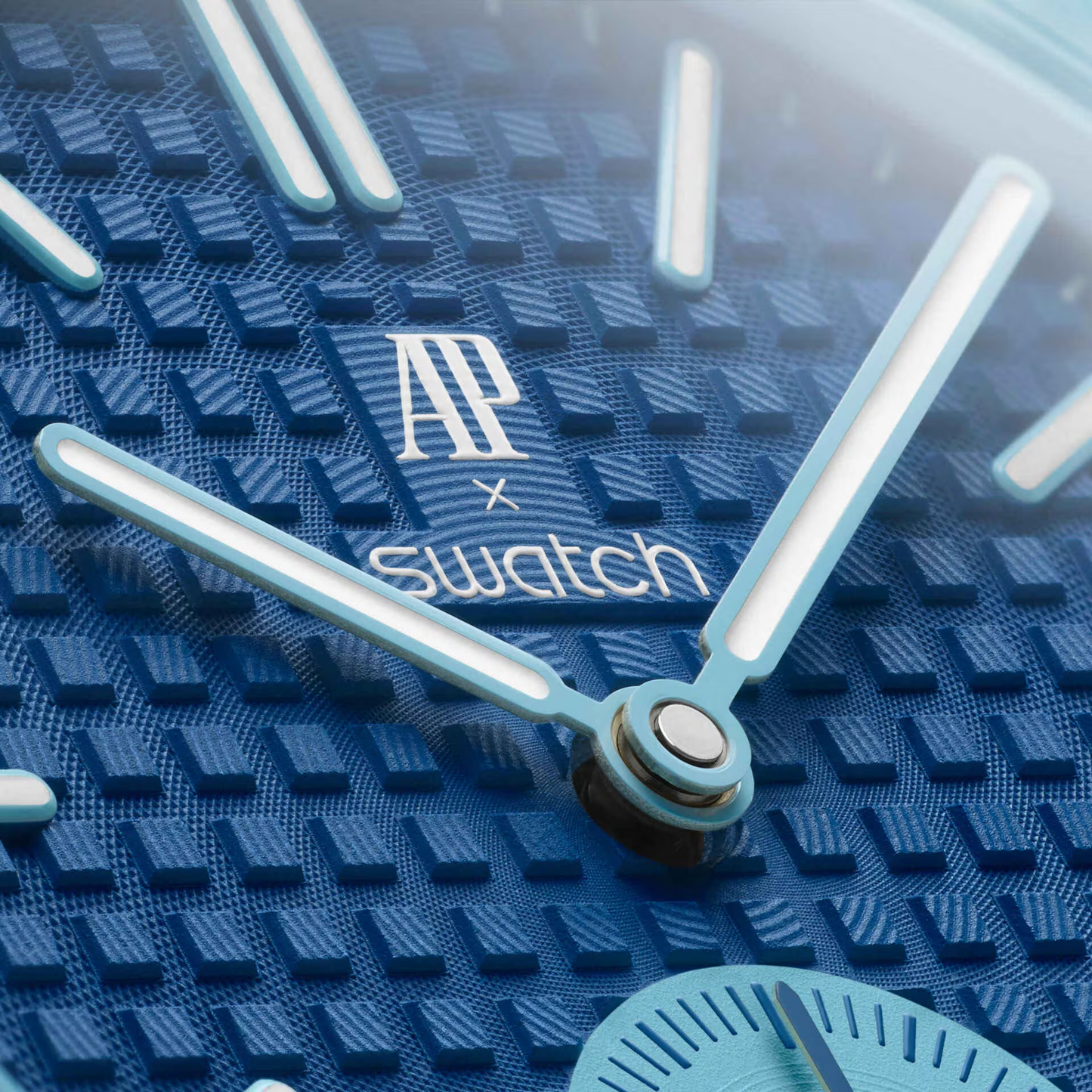 inkspireluxury Audemars Piguet x Swatch pocket watch featuring a blue geometric grid dial and luminous hands